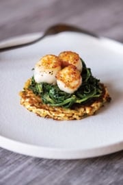 Seared Scallops on Parsnip Rosti with Wilted Greens