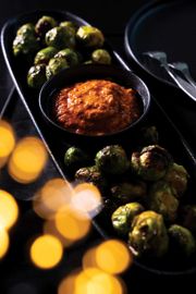 Brussels Sprouts with Pomegranate Molasses and Smoky Red Pepper Hummus